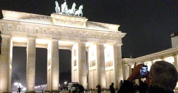 Brandeburg Gate in Berlin, Lit Up at Night, adapted from image at state.gov