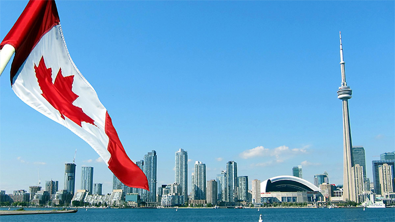 Toronto Skyline and Canadian Flag, adapted from image at usda.gov