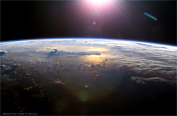 File Image of Outer Space, Curve of Earth, Sun