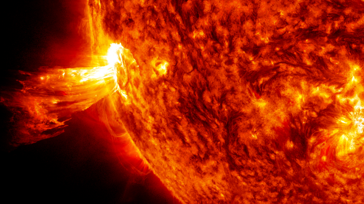 Sun and Solar Flare, adapted from NASA image at noaa.gov